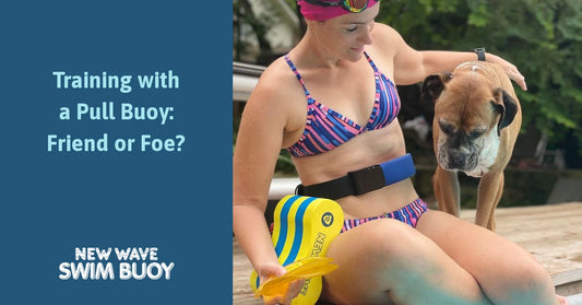 Hailey with a yellow and blue New Wave pull buoy — Training with a Pull Buoy: Friend or Foe?